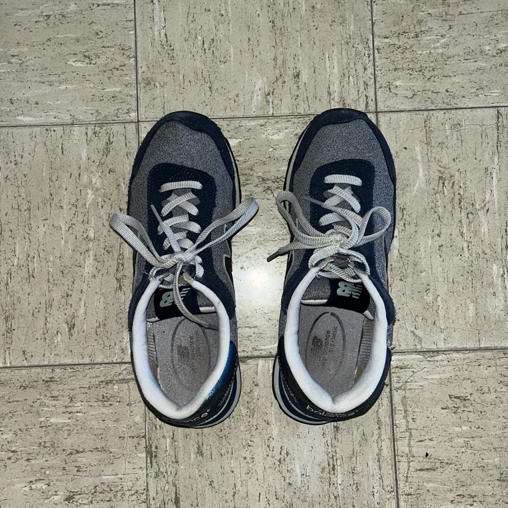 New balance blue metallic size 8W.